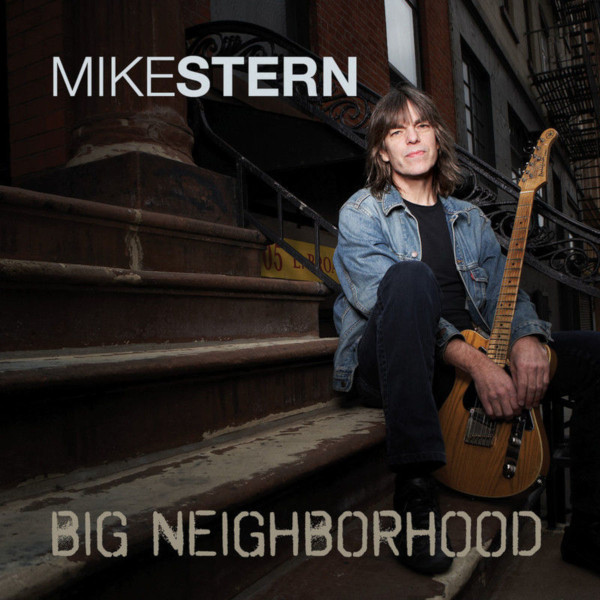 Album art for Mike Stern - Big Neighborhood shows Mike Stern sitting with his guitar on stair steps.